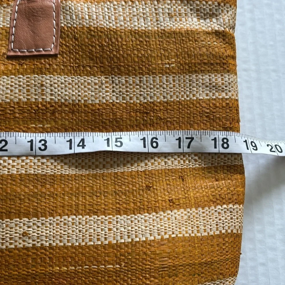 Striped Cream and Golden Orange Women's Woven Straw Bag with Tassel Design